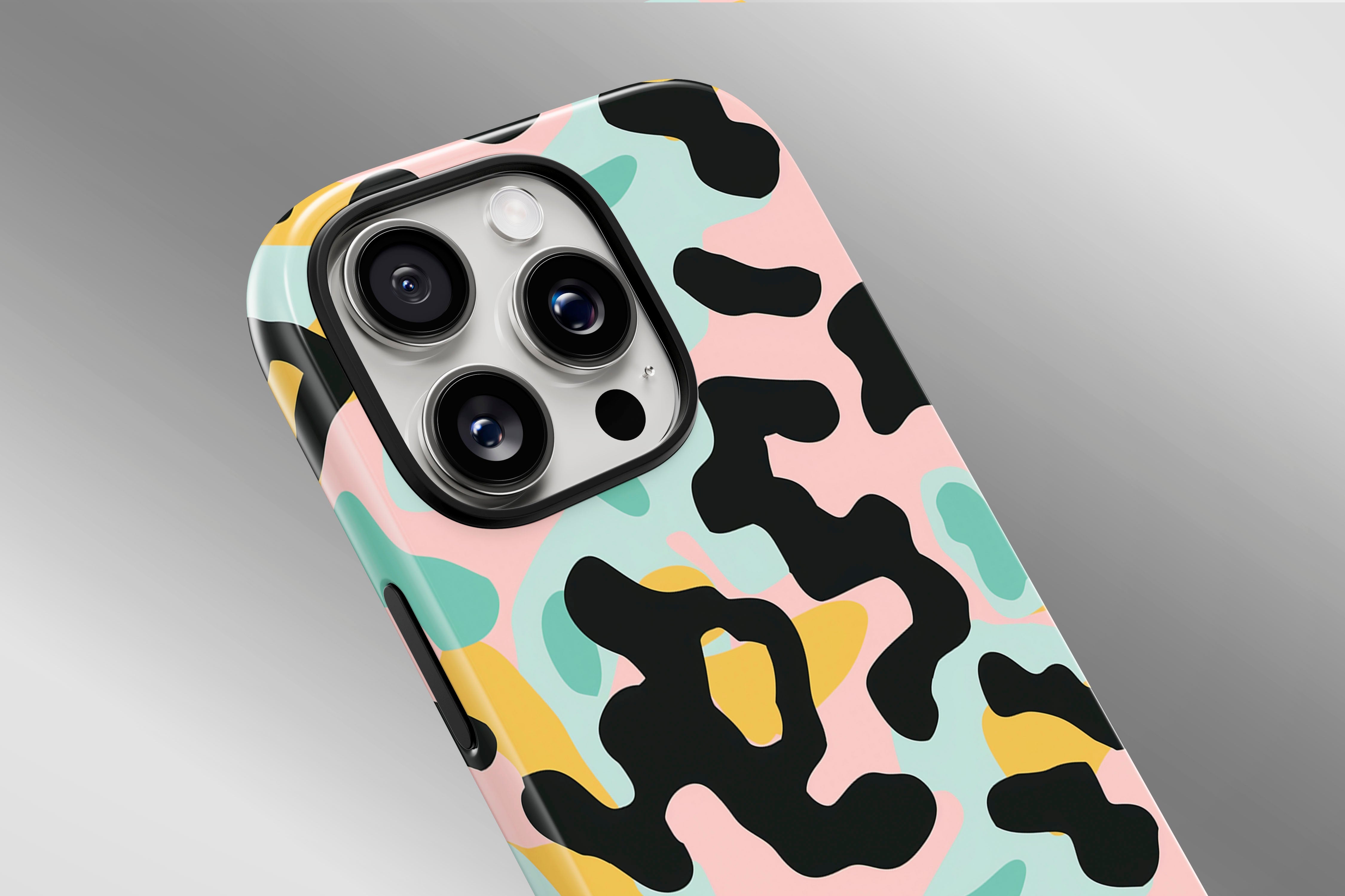 A close up image of a phone case featuring our 80S Camo Cool design