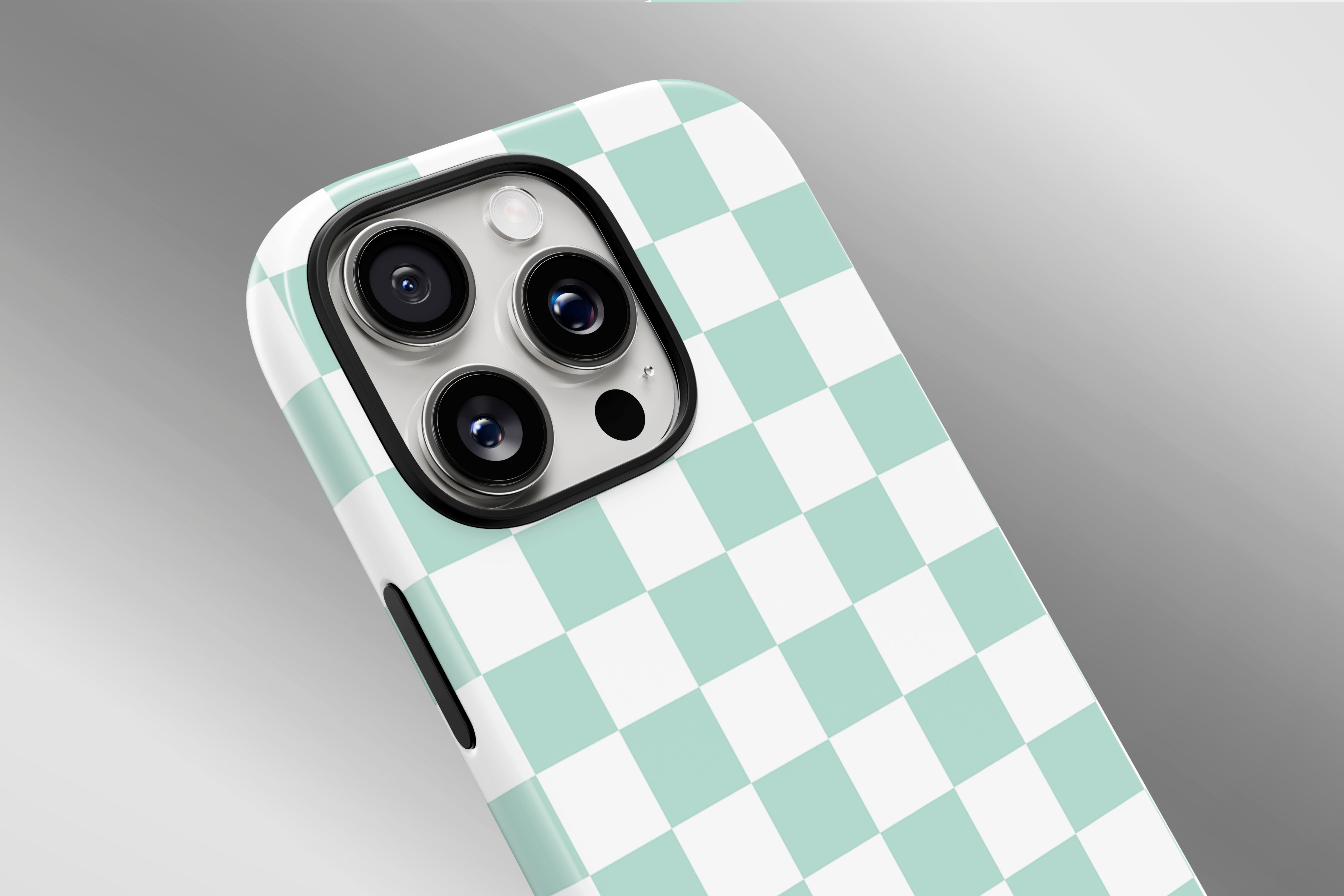 A close up image of a phone case featuring our Aqua Checkerboard design