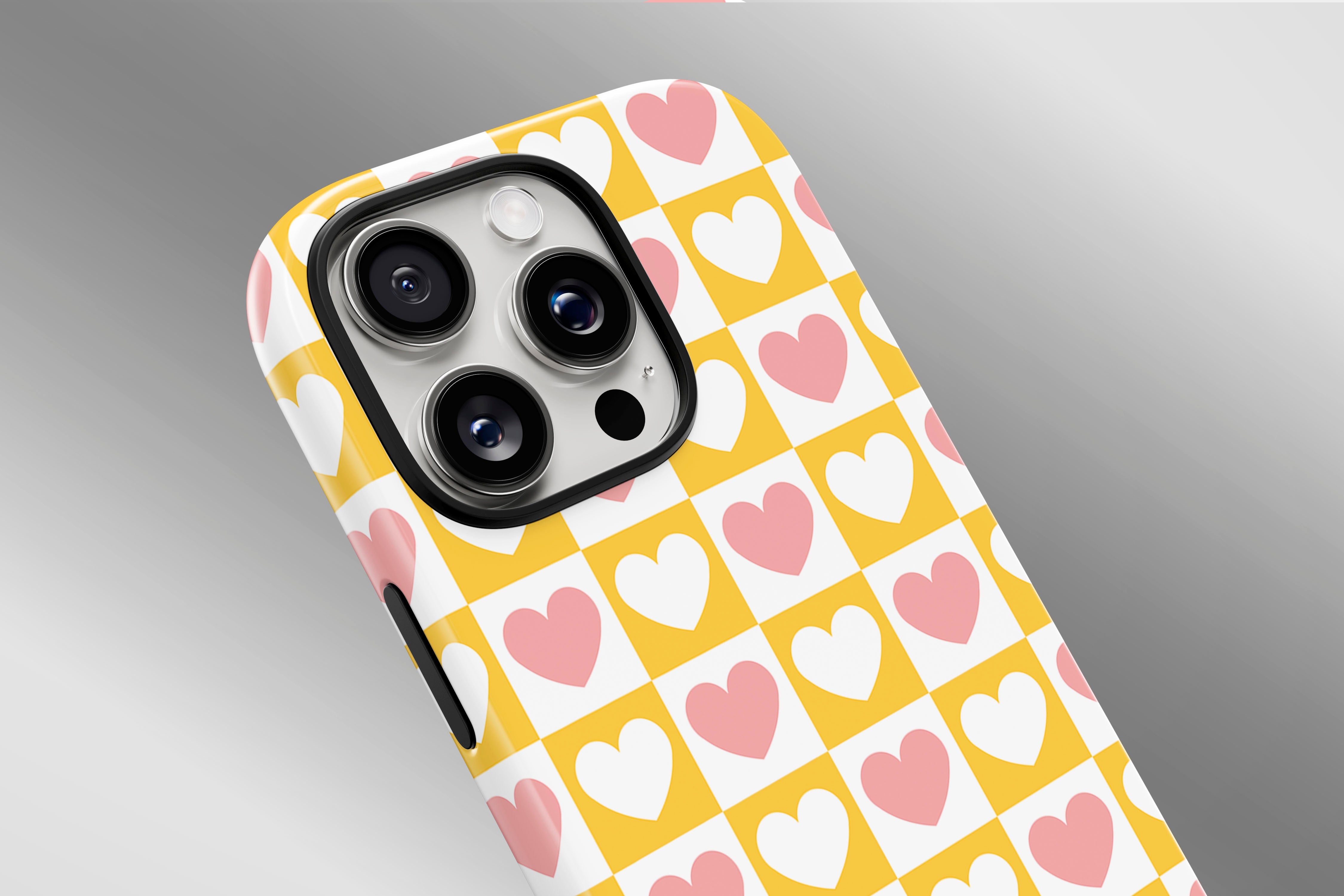 A close up image of a phone case featuring our Check Heart design