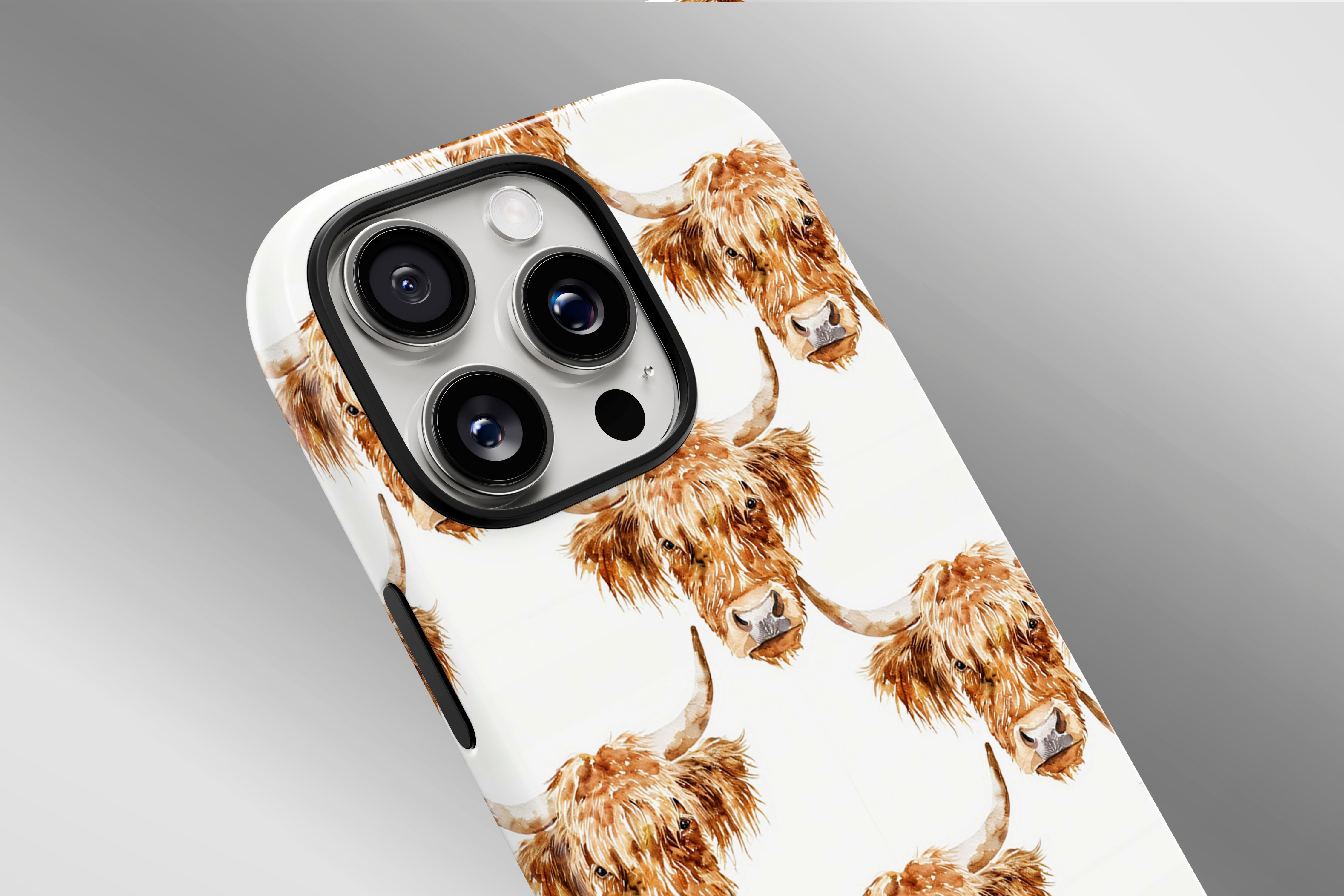 A close up image of a phone case featuring our Highland Cow design