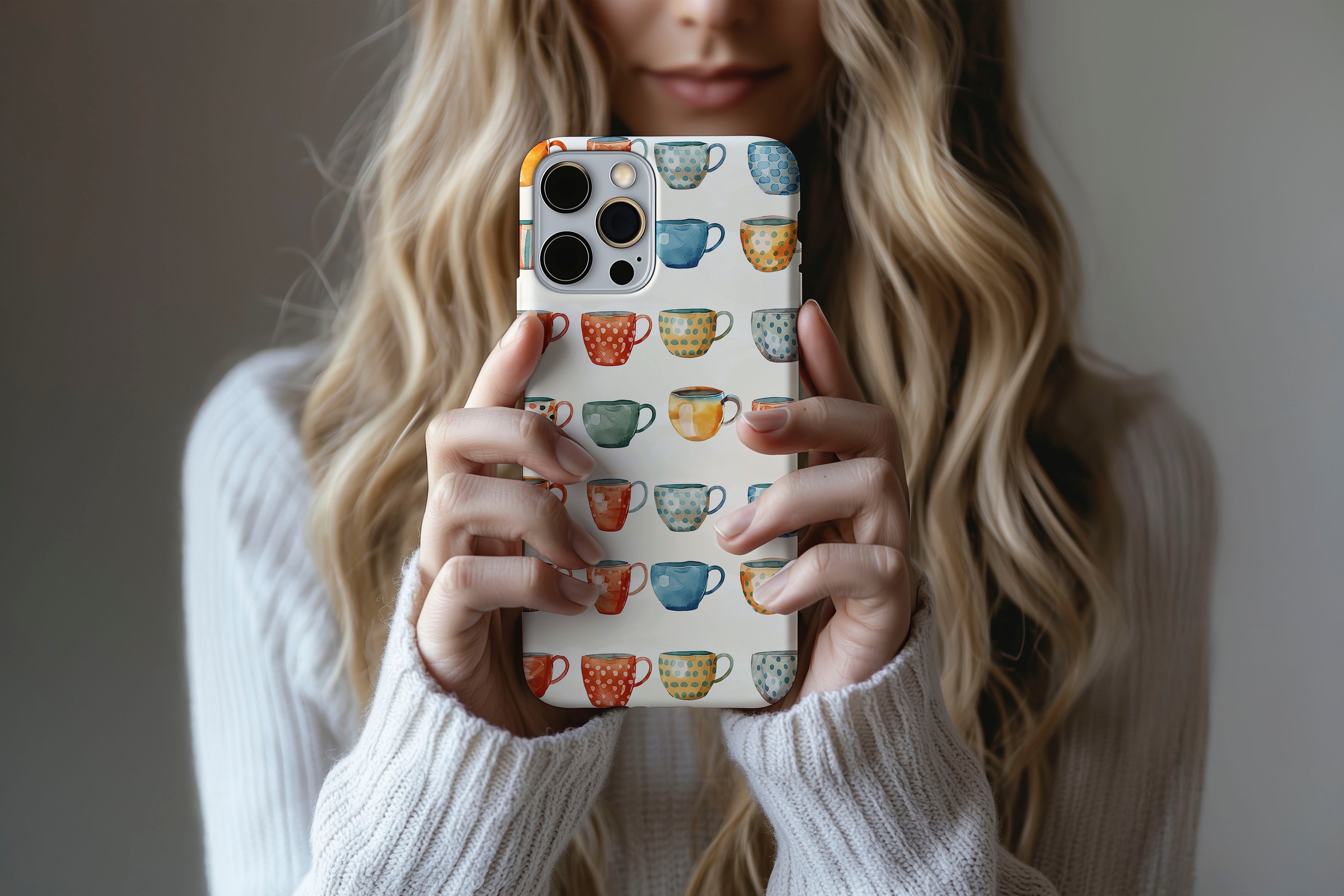 A cute girl holding a phone case featuring our My Cup Of Tea design
