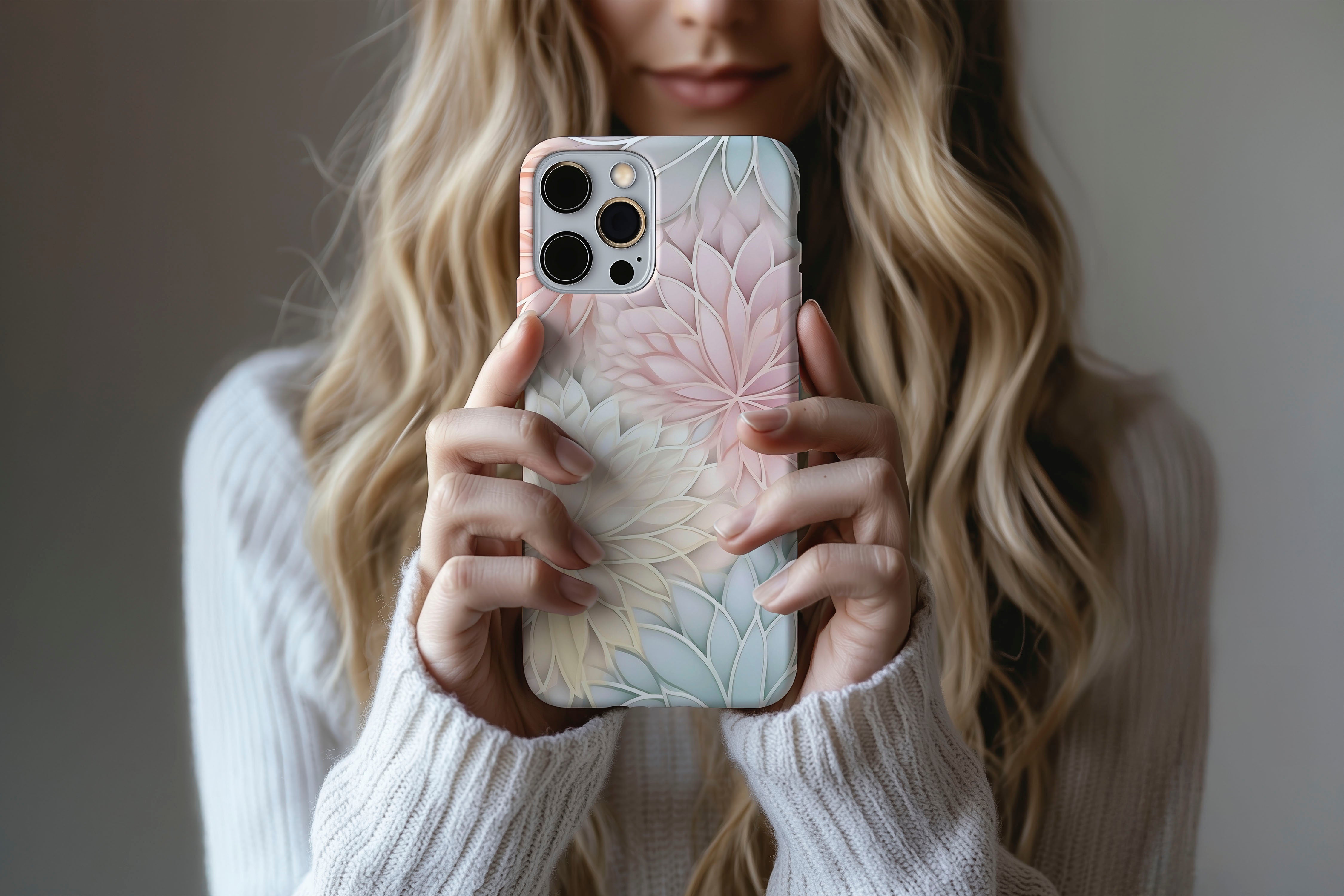 A cute girl holding a phone case featuring our Papier Mache design