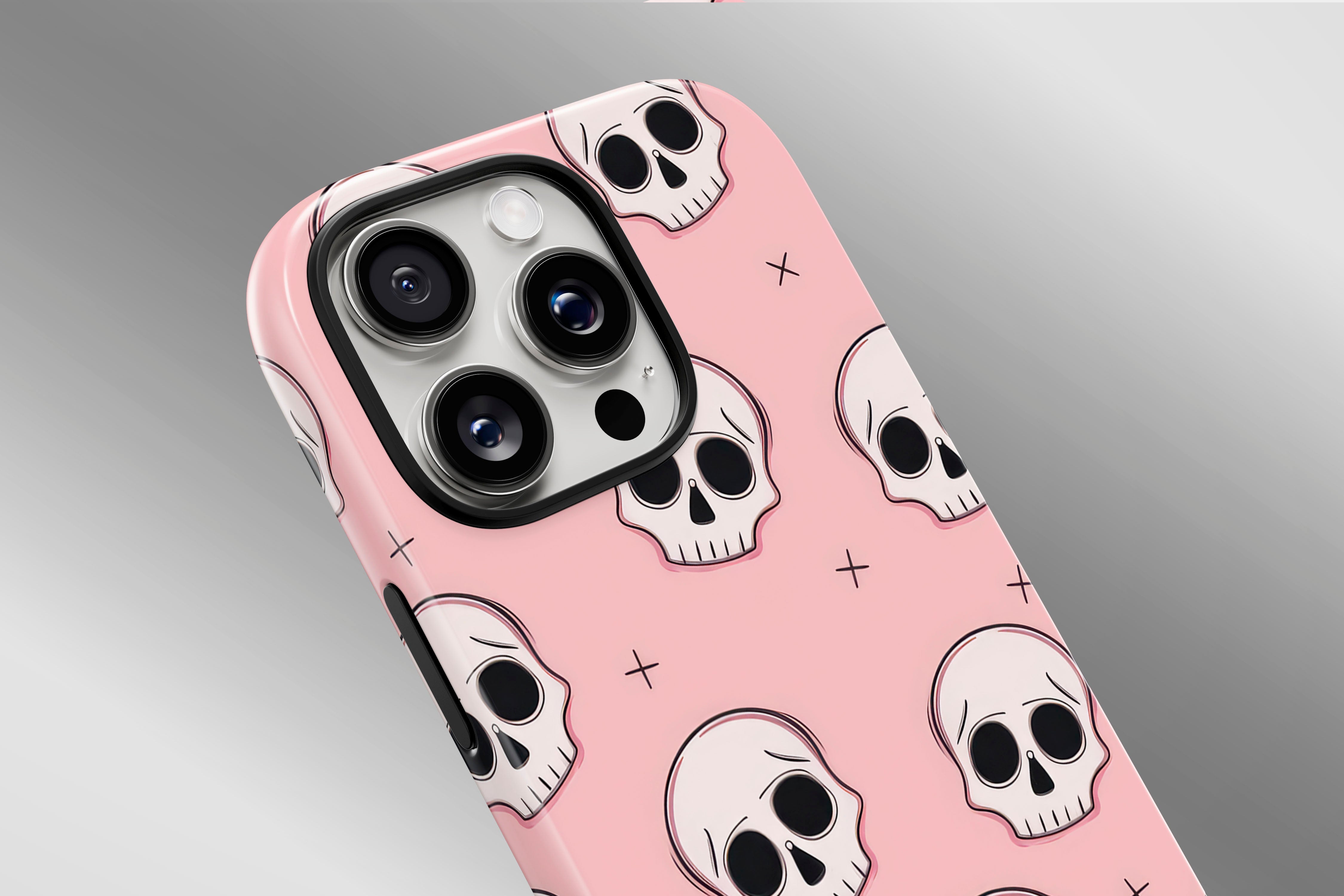 A close up image of a phone case featuring our Skulls design