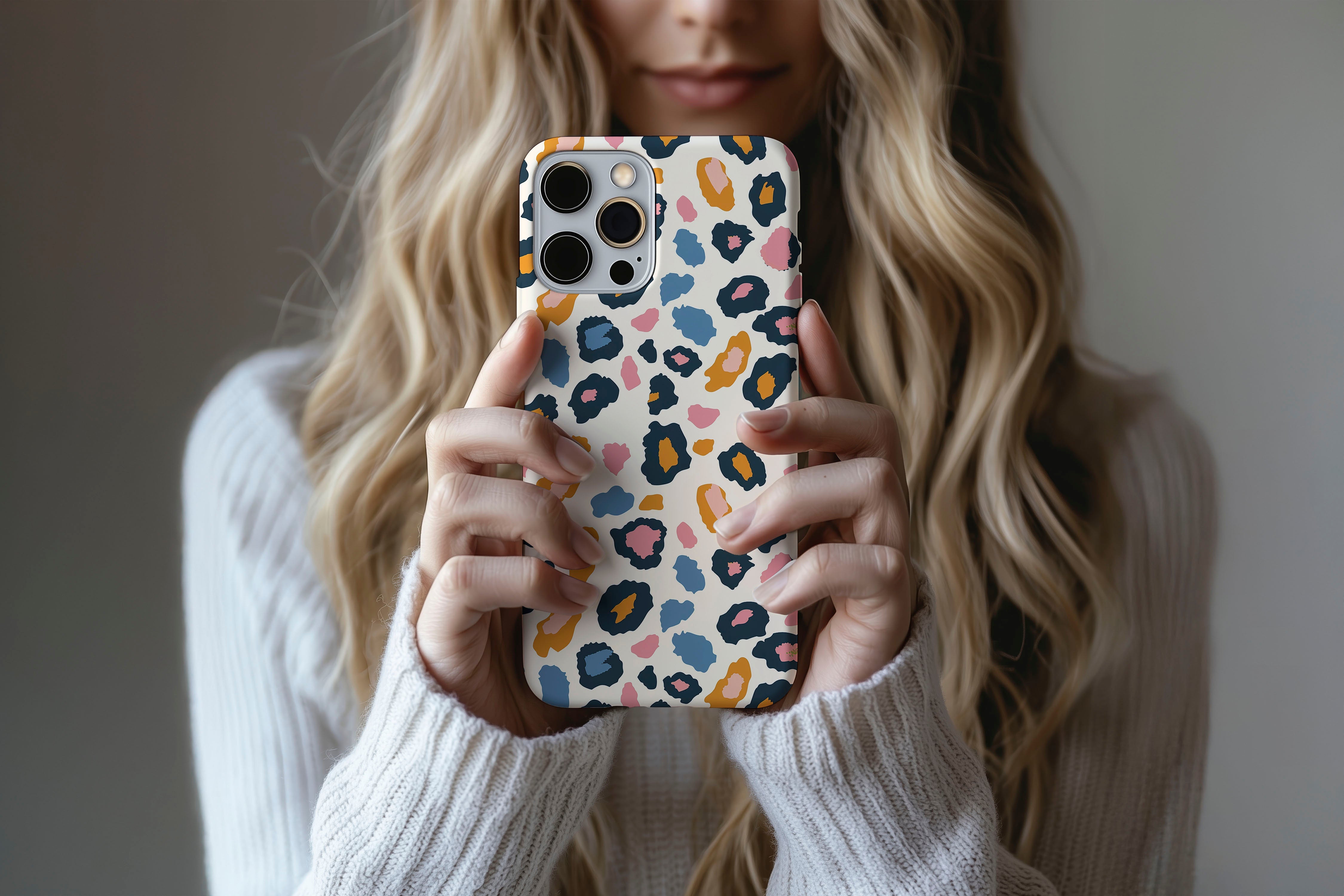 A cute girl holding a phone case featuring our Animal Control design