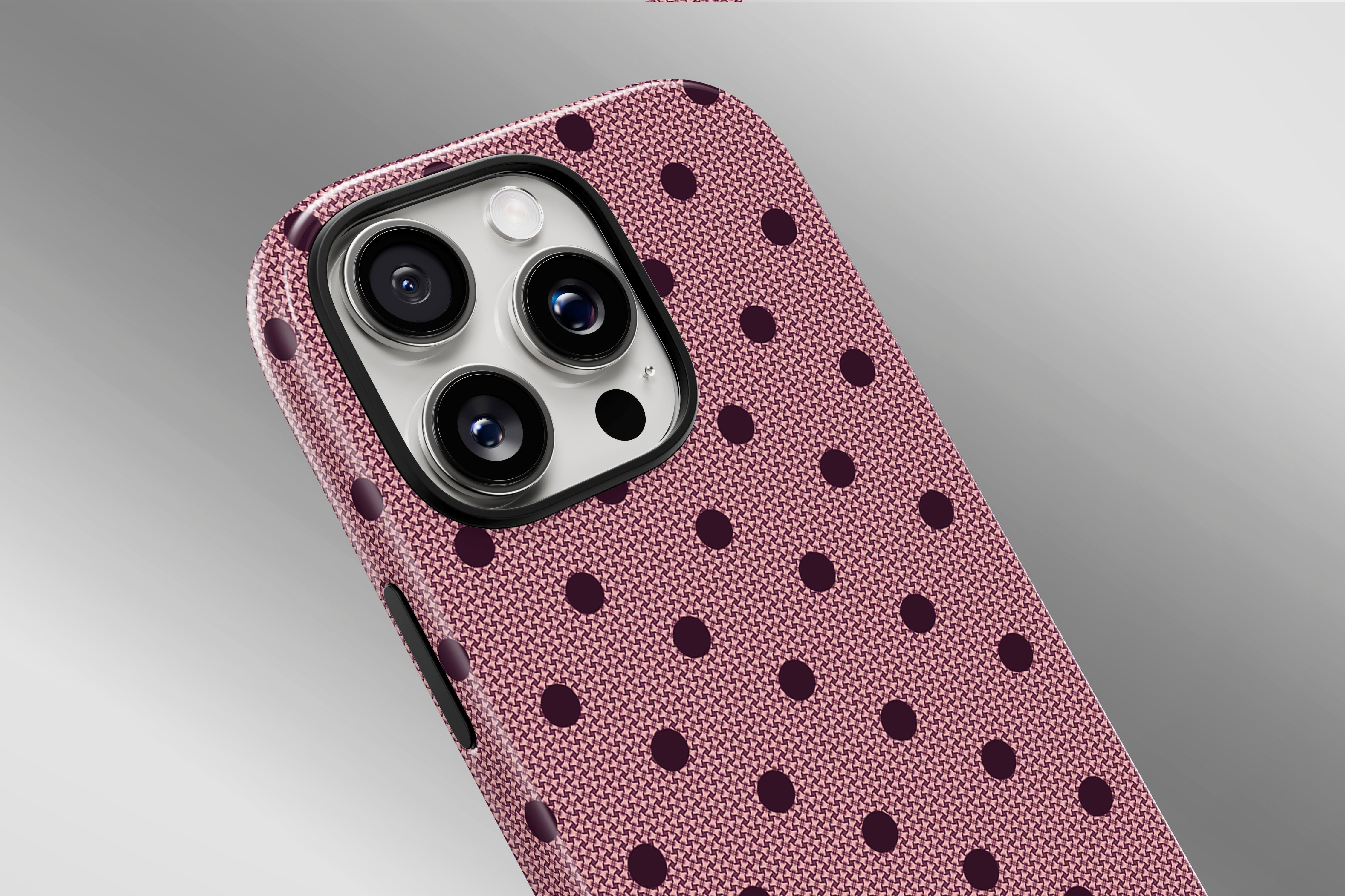 A close up image of a phone case featuring our Burgundy Spot design