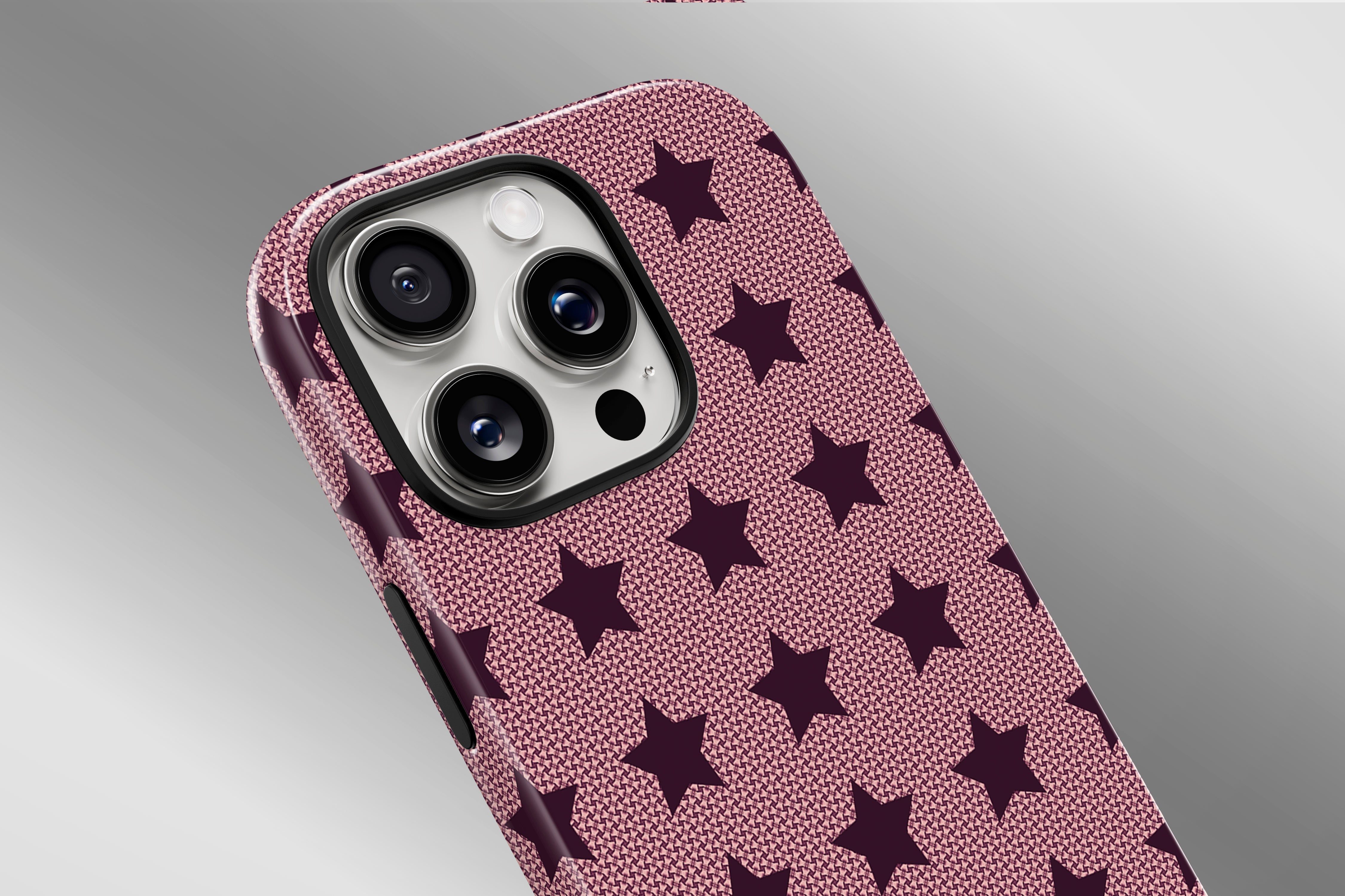 A close up image of a phone case featuring our Burgundy Stars design