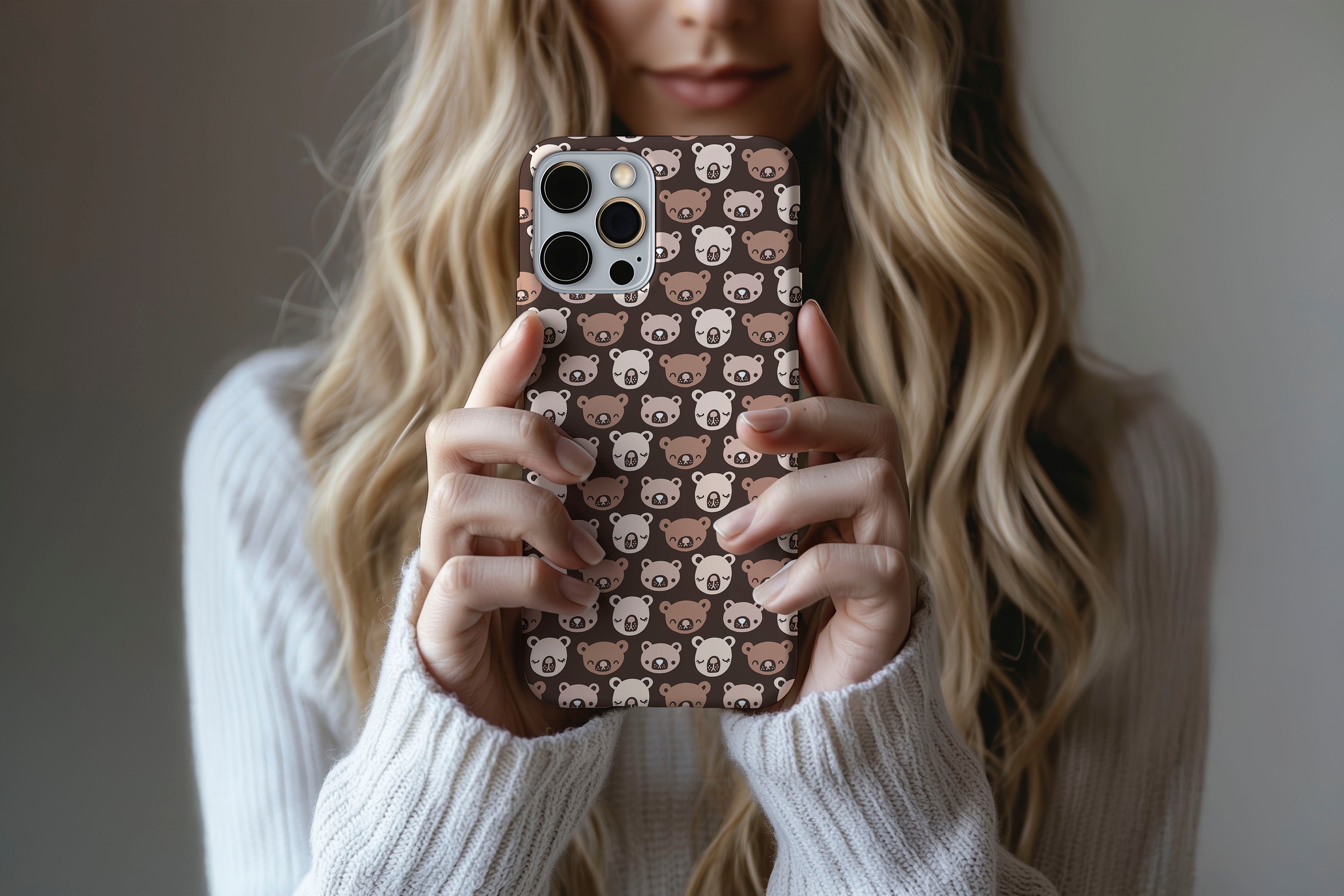 A cute girl holding a phone case featuring our Cute Bear design
