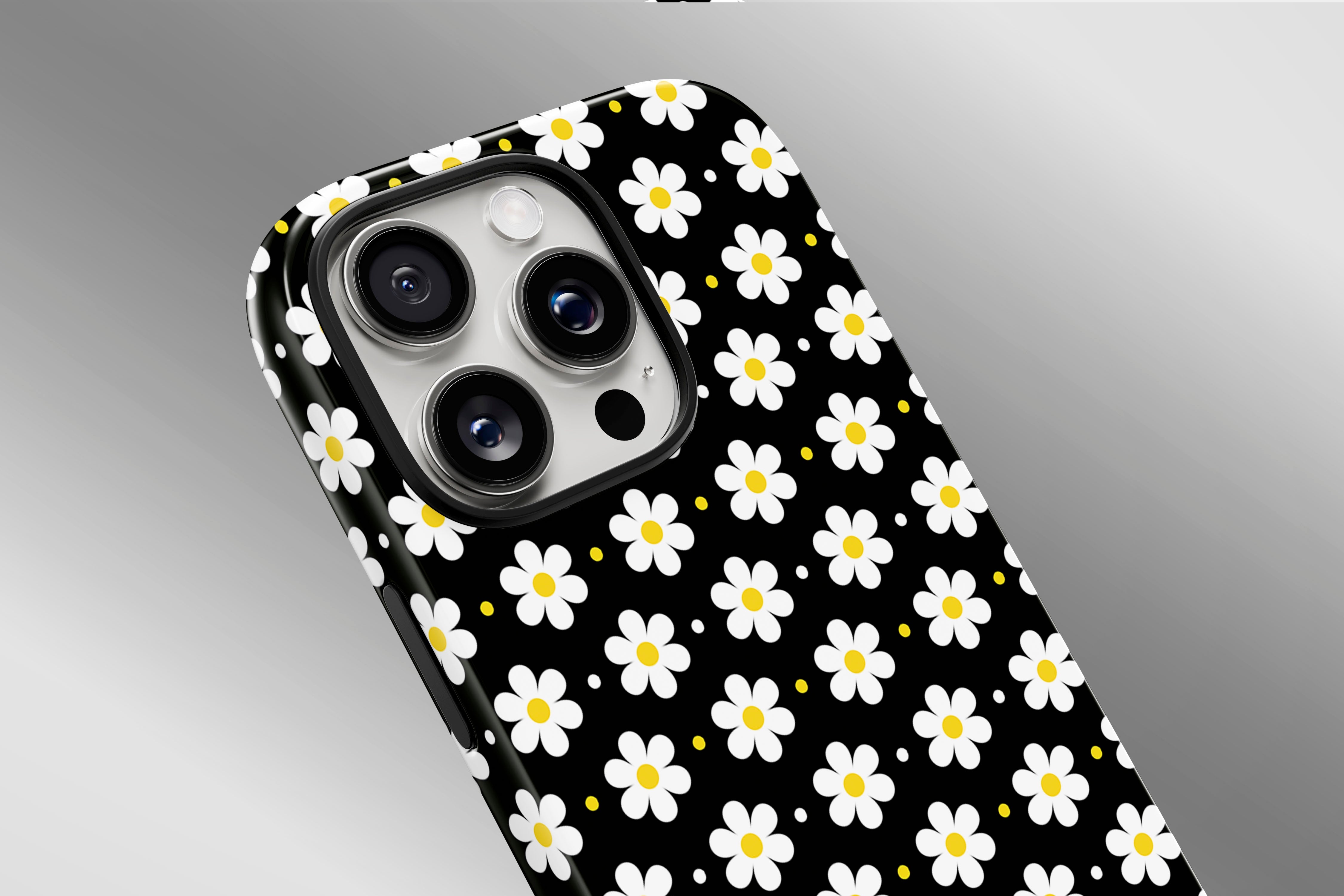 A close up image of a phone case featuring our Ditsy Daisy design