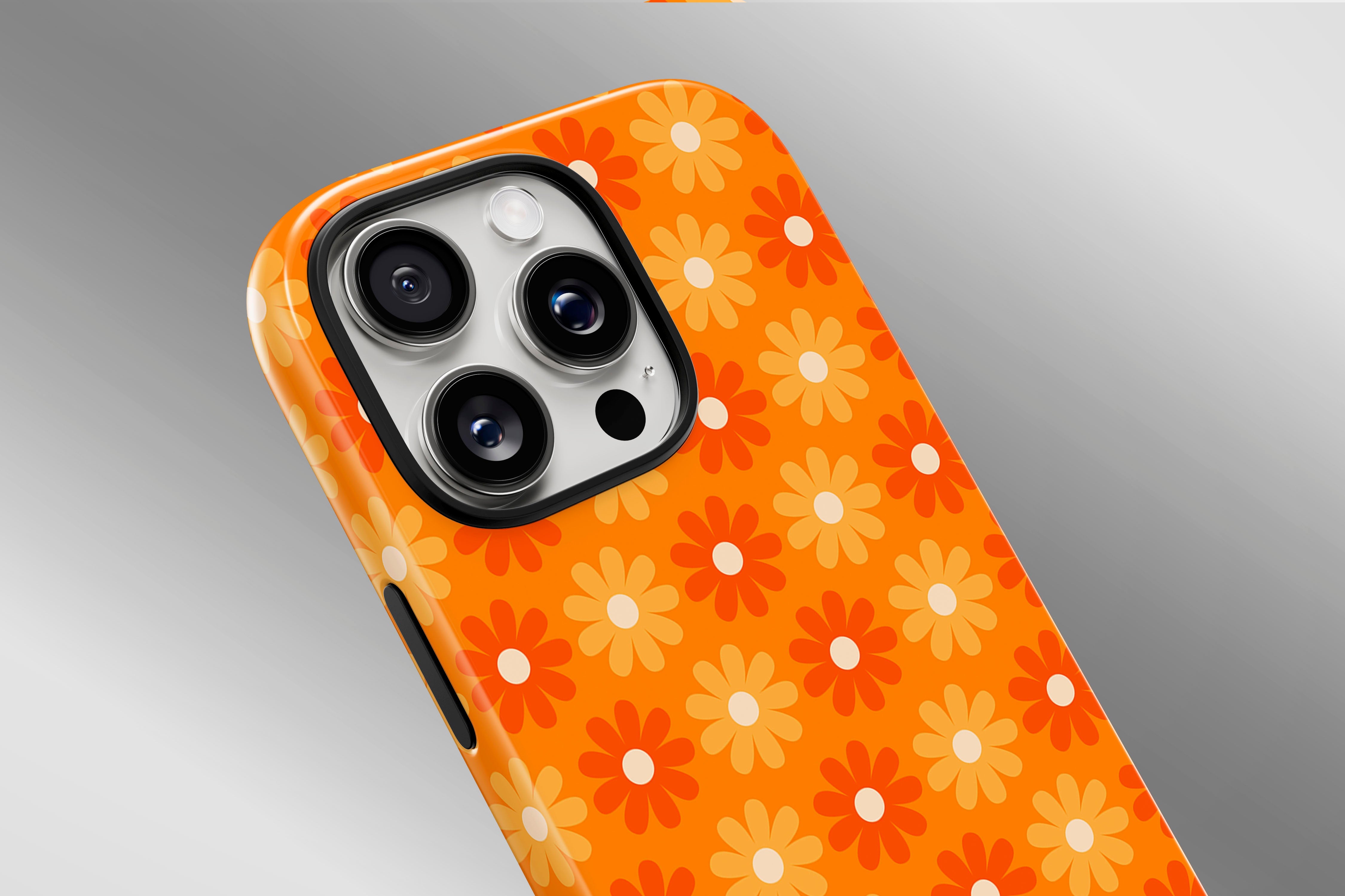 A close up image of a phone case featuring our Flaming Daisy design