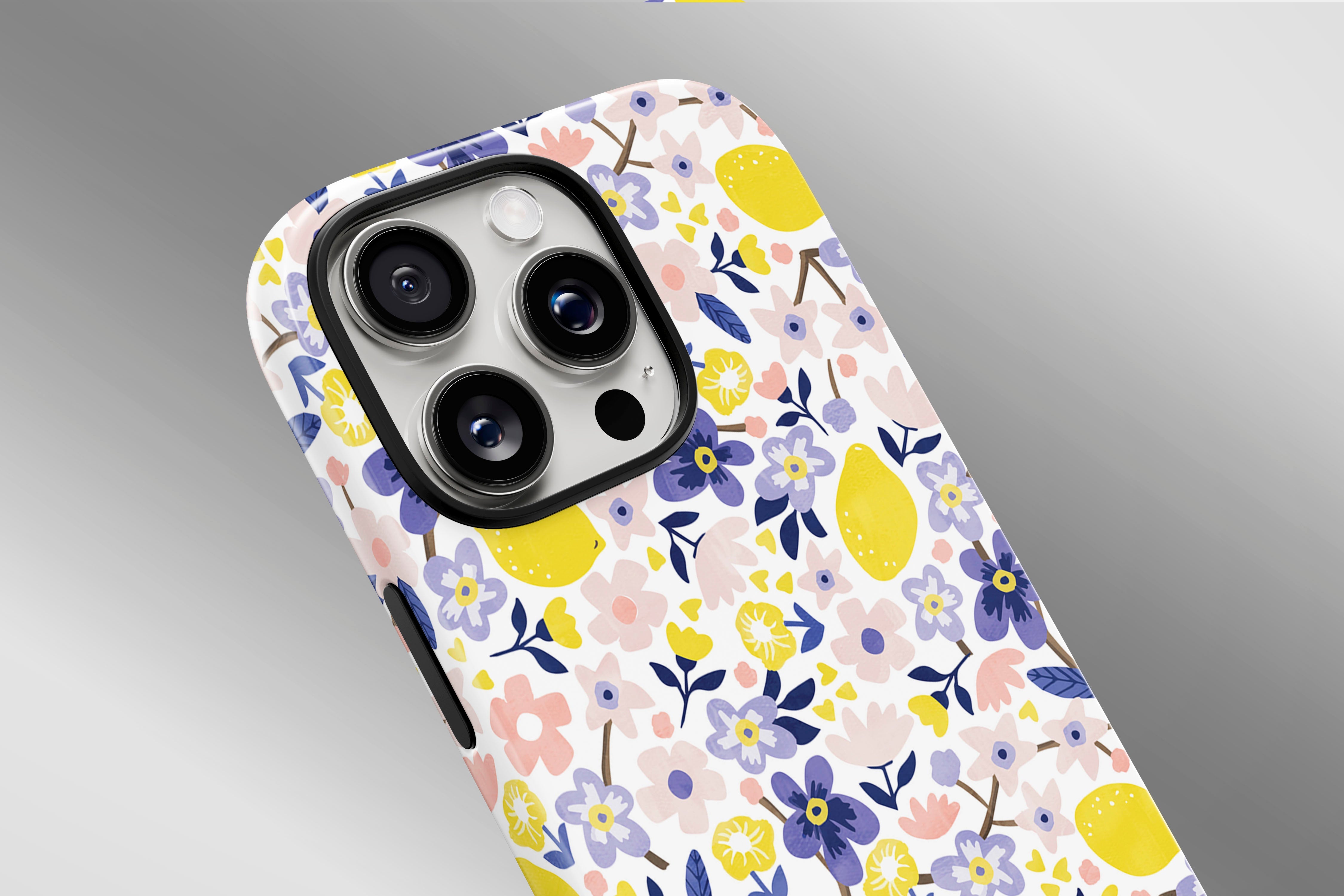 A close up image of a phone case featuring our Flora Lemon design
