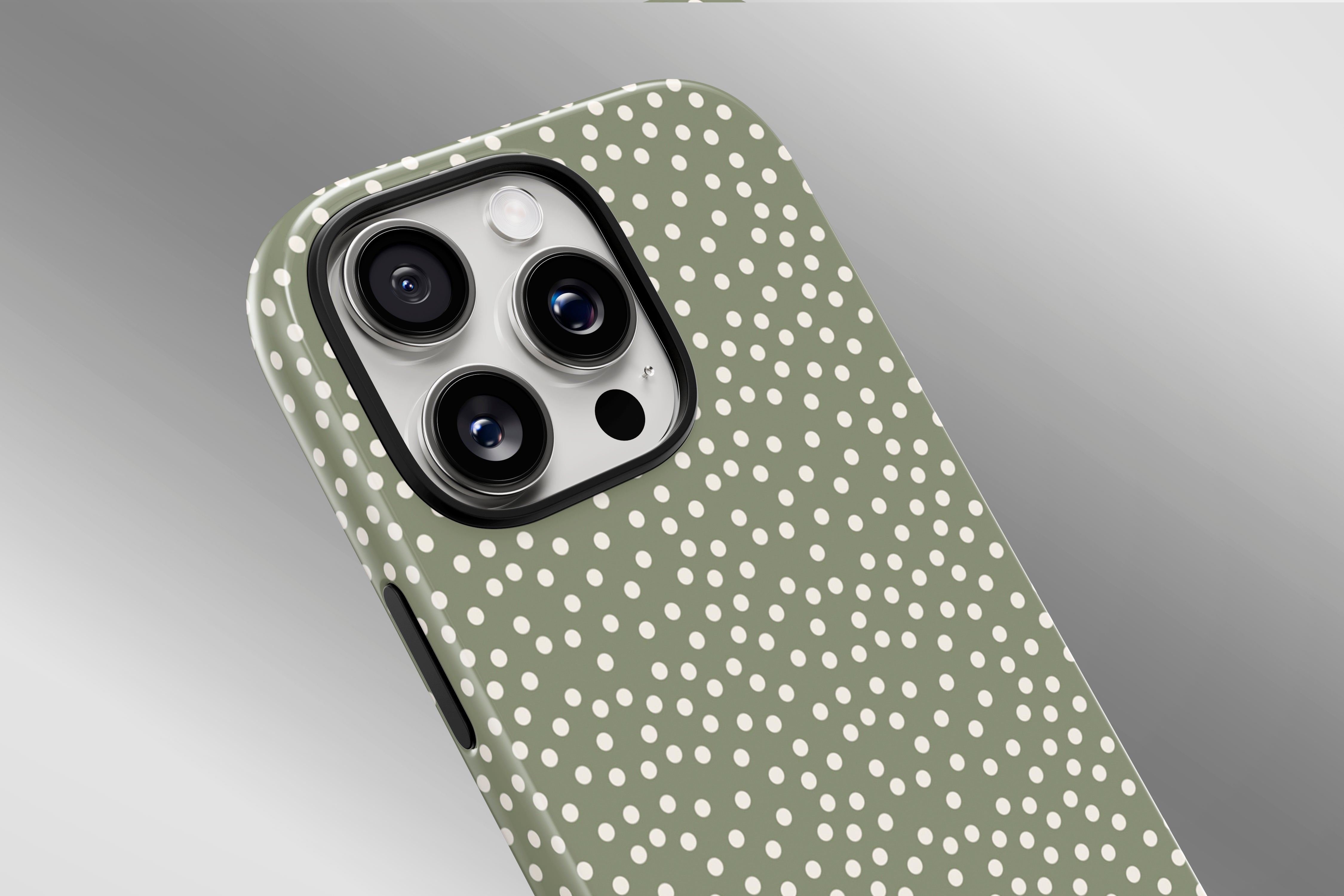 A close up image of a phone case featuring our Green Dot design