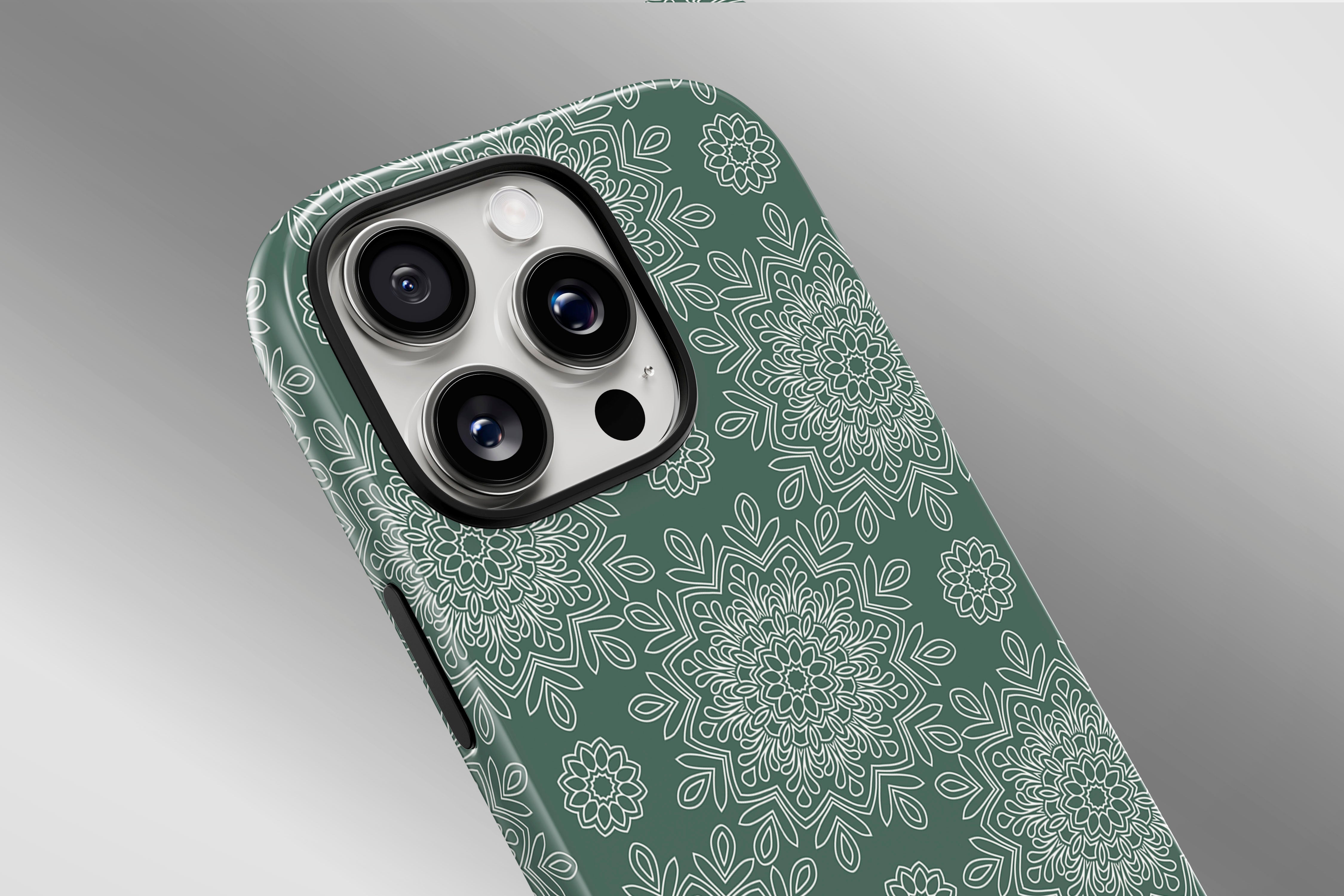 A close up image of a phone case featuring our Green Mandala design