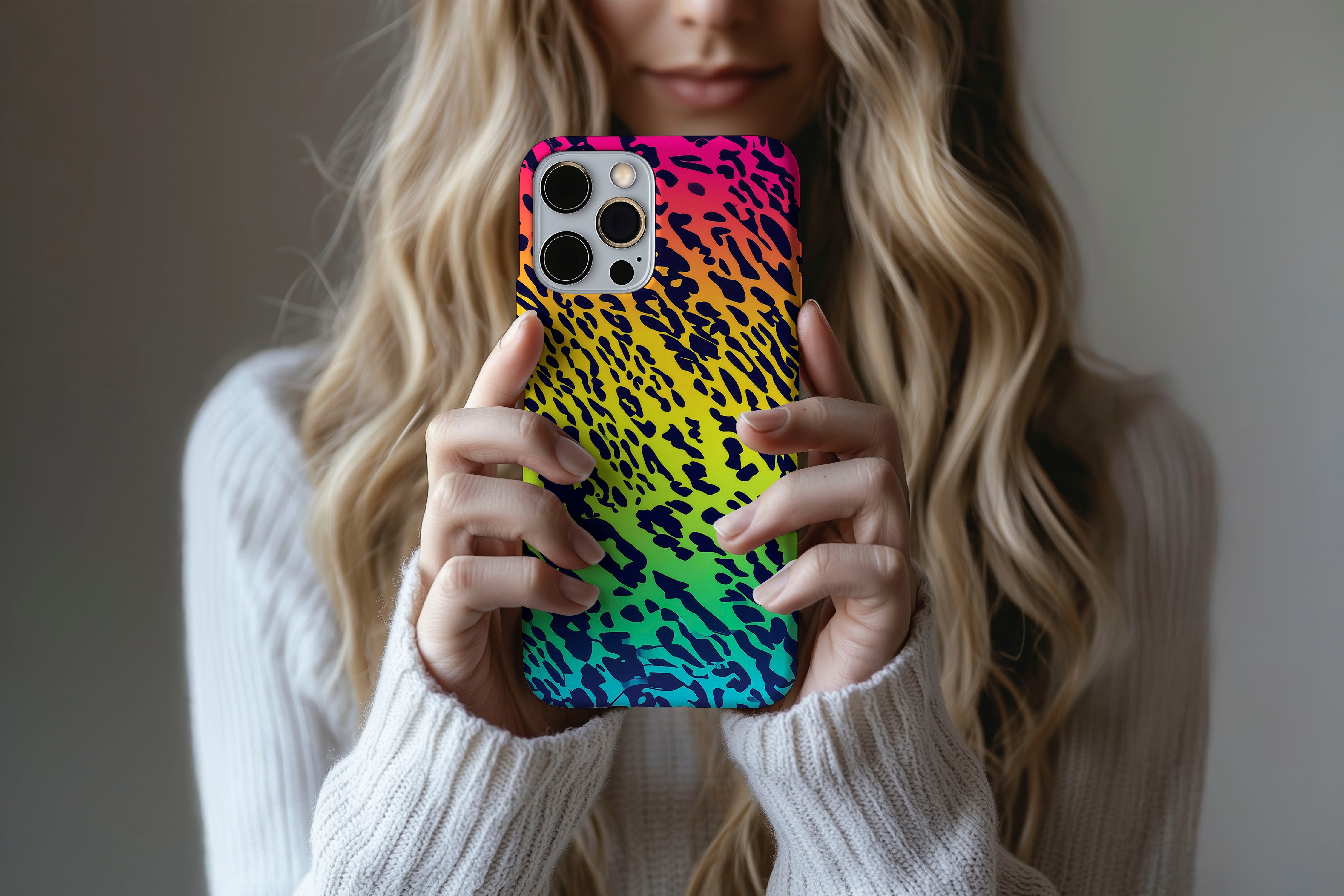 A cute girl holding a phone case featuring our Party Animal design