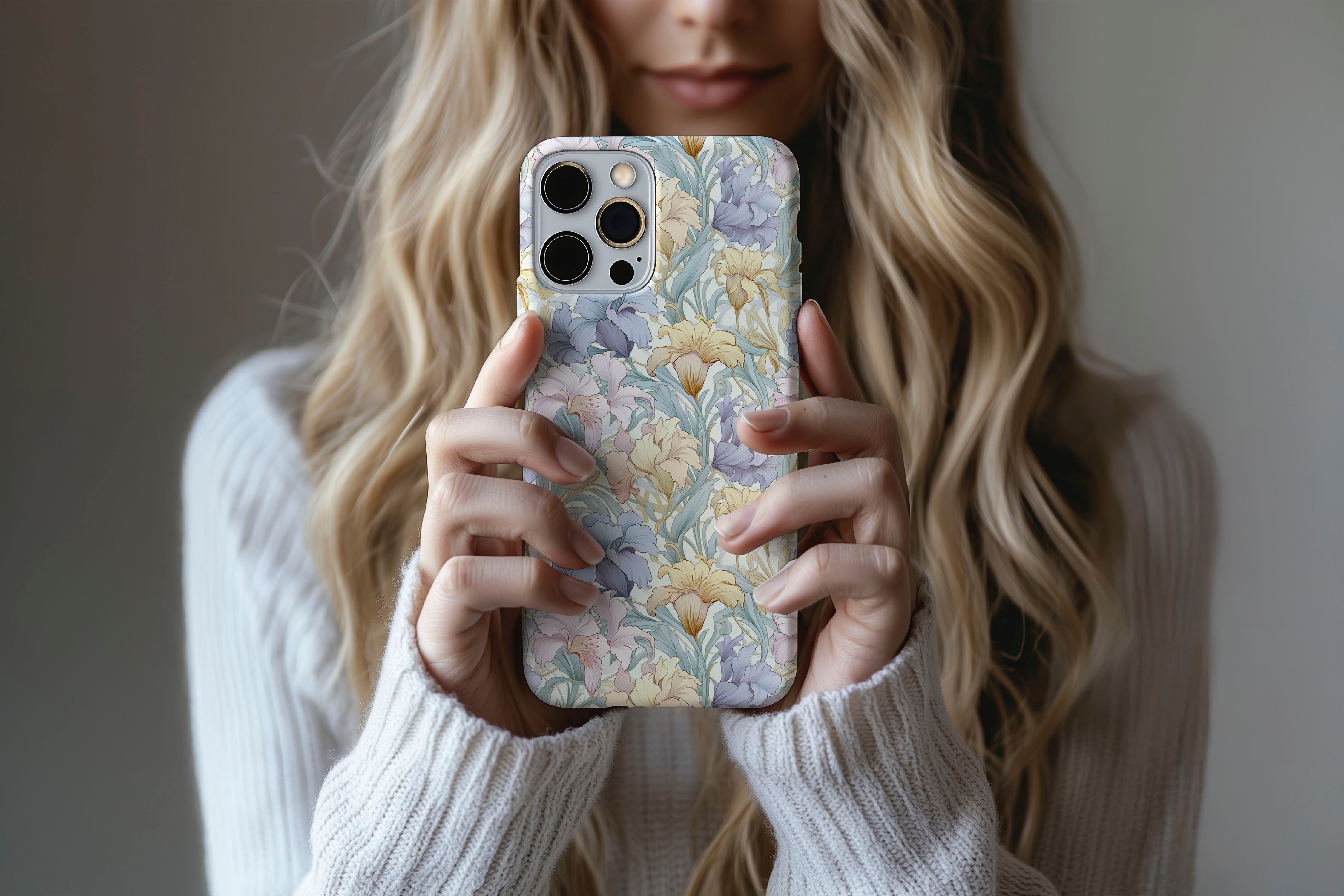 A cute girl holding a phone case featuring our Pastel Dream design