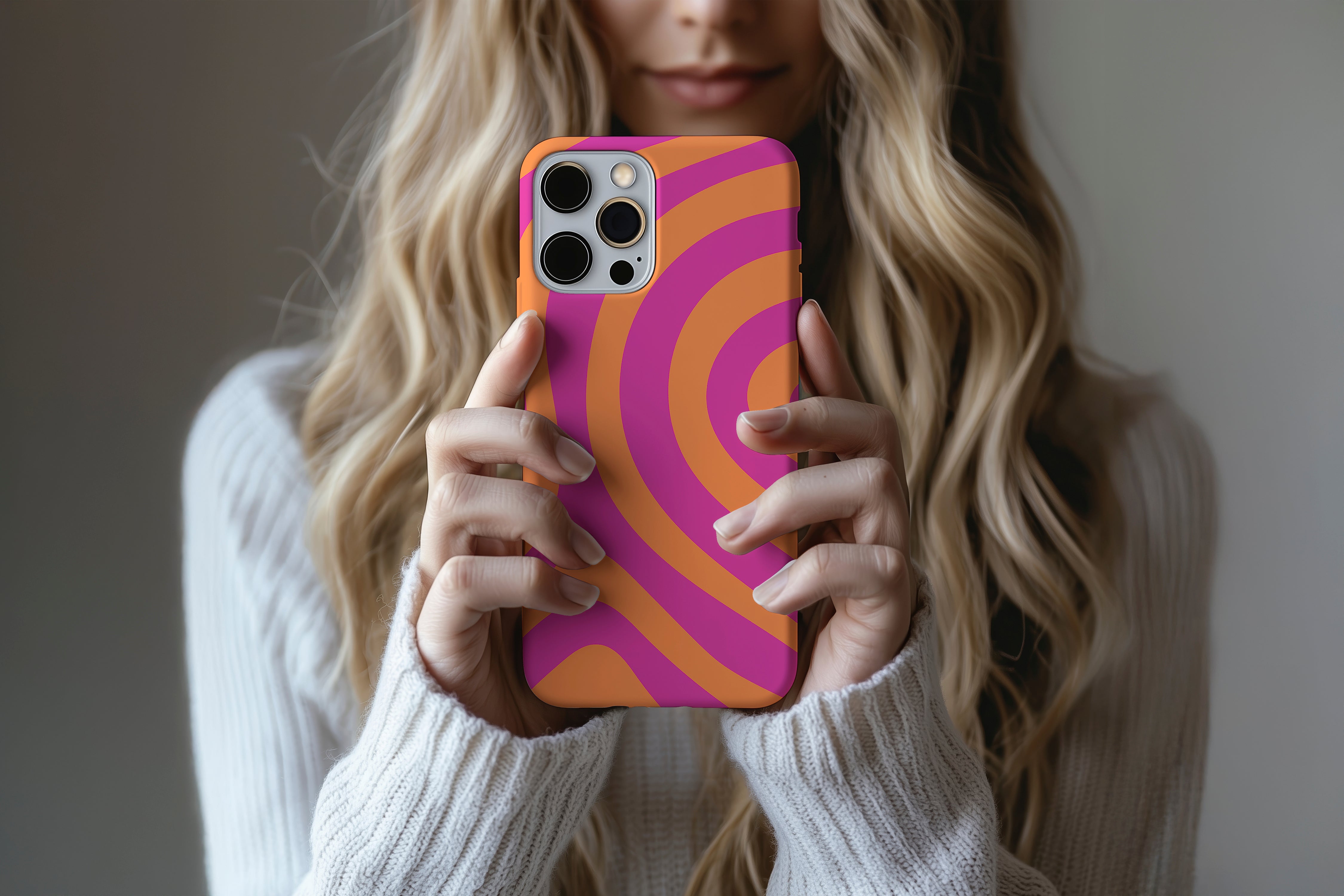 A cute girl holding a phone case featuring our Powers design