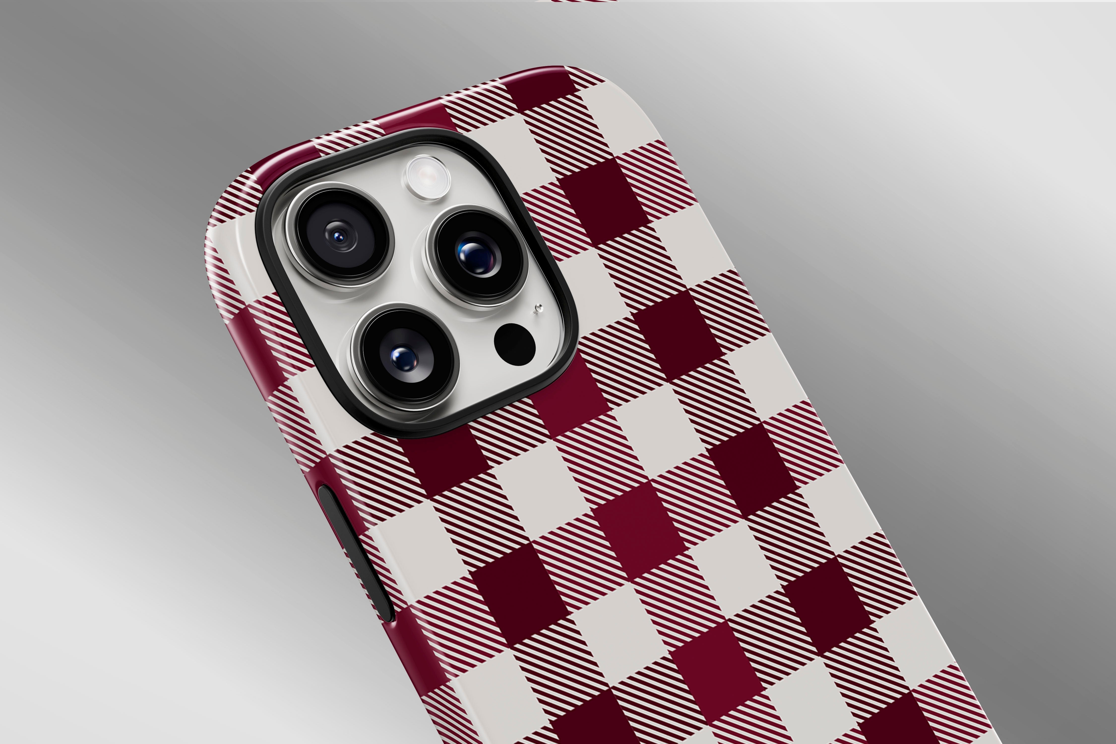 A close up image of a phone case featuring our Red Check design