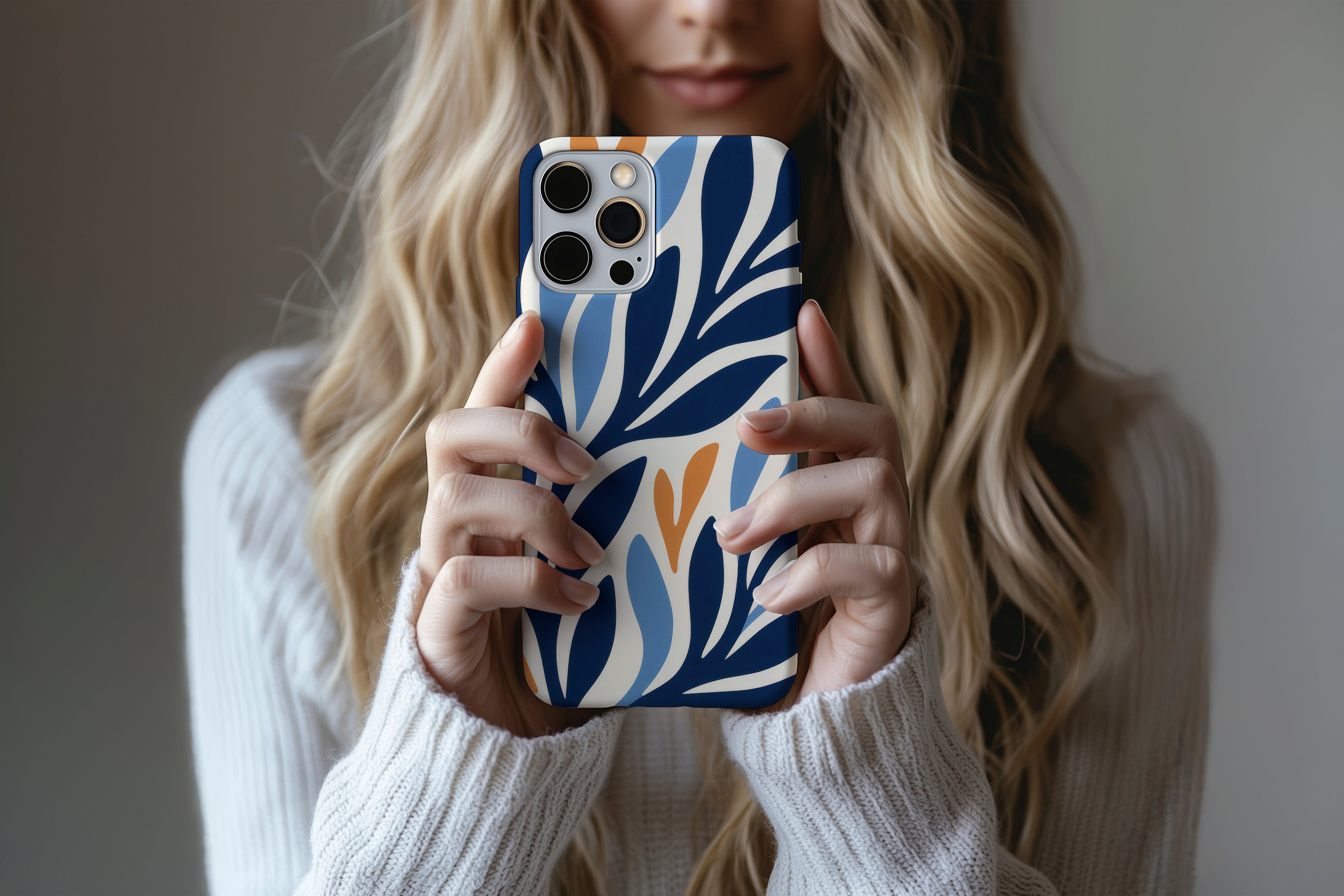 A cute girl holding a phone case featuring our See Weed design