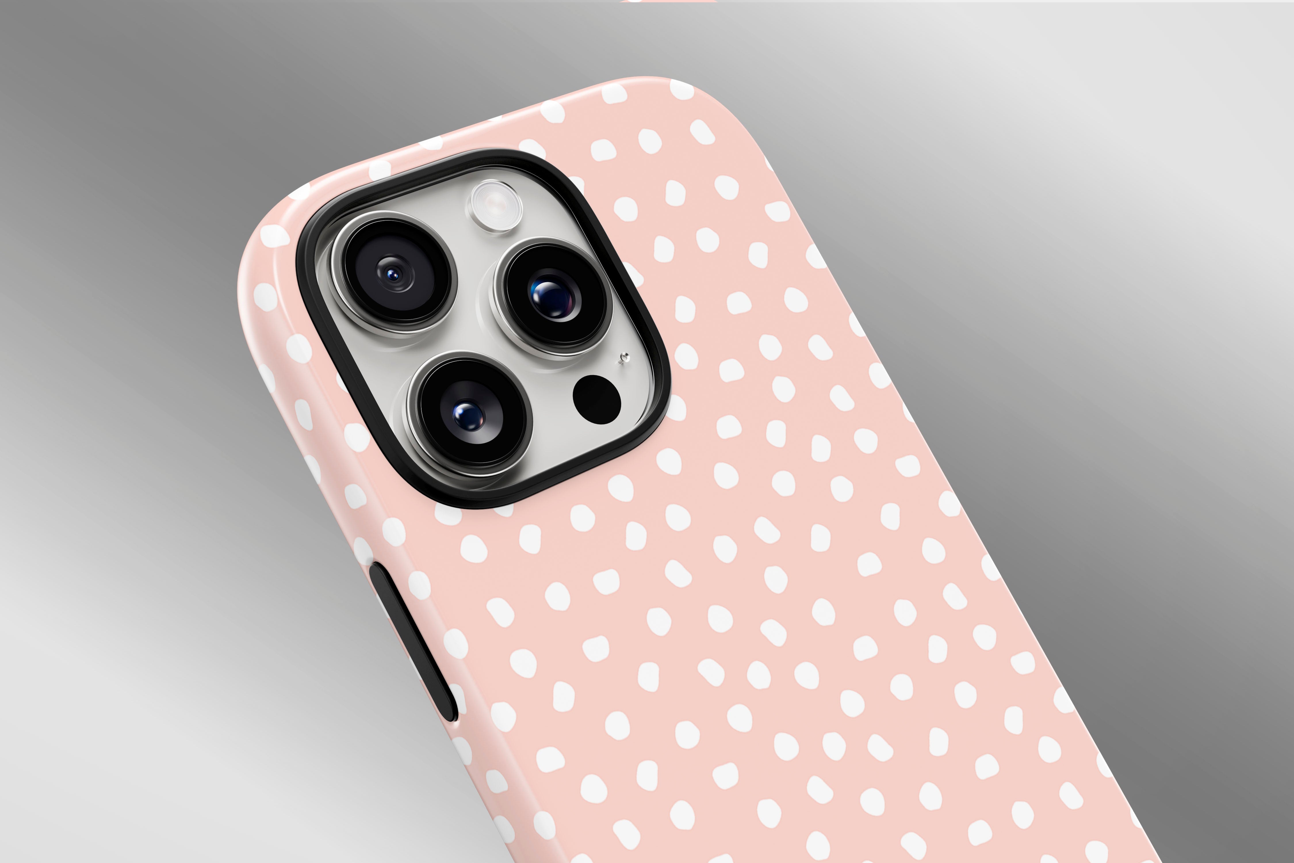 A close up image of a phone case featuring our White Bits design