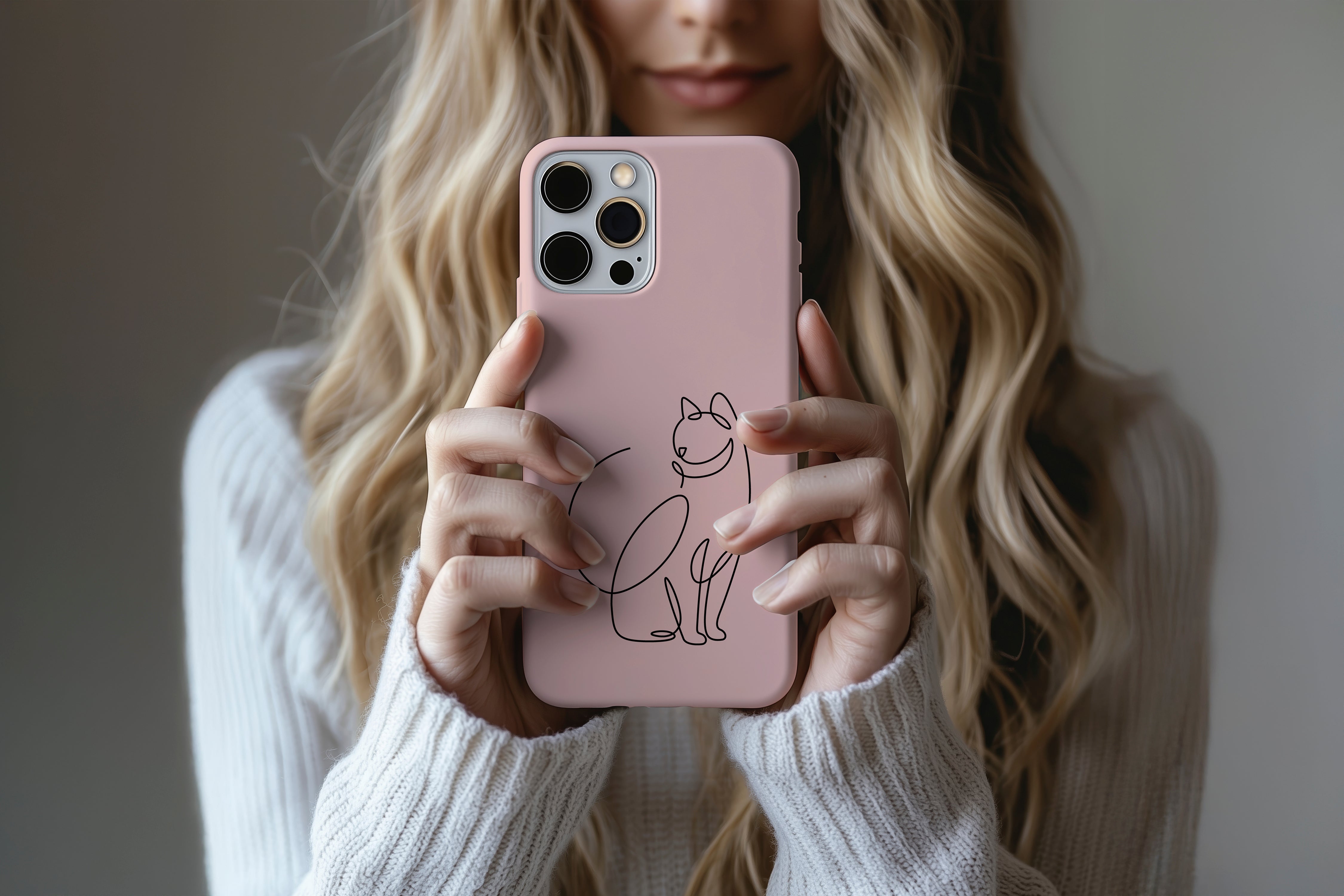 A cute girl holding a phone case featuring our Artful Cat  design
