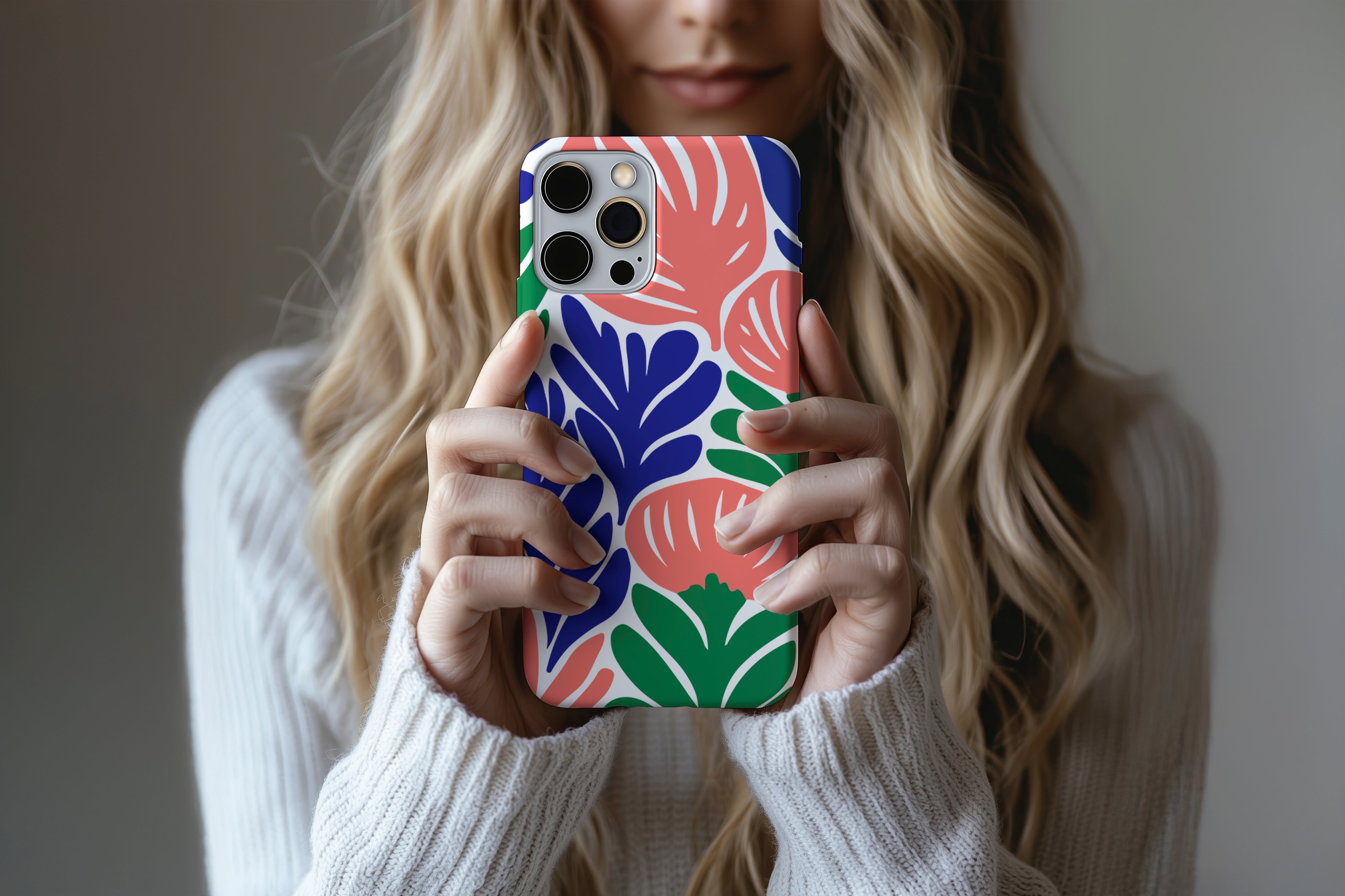 A cute girl holding a phone case featuring our Funkadelic design