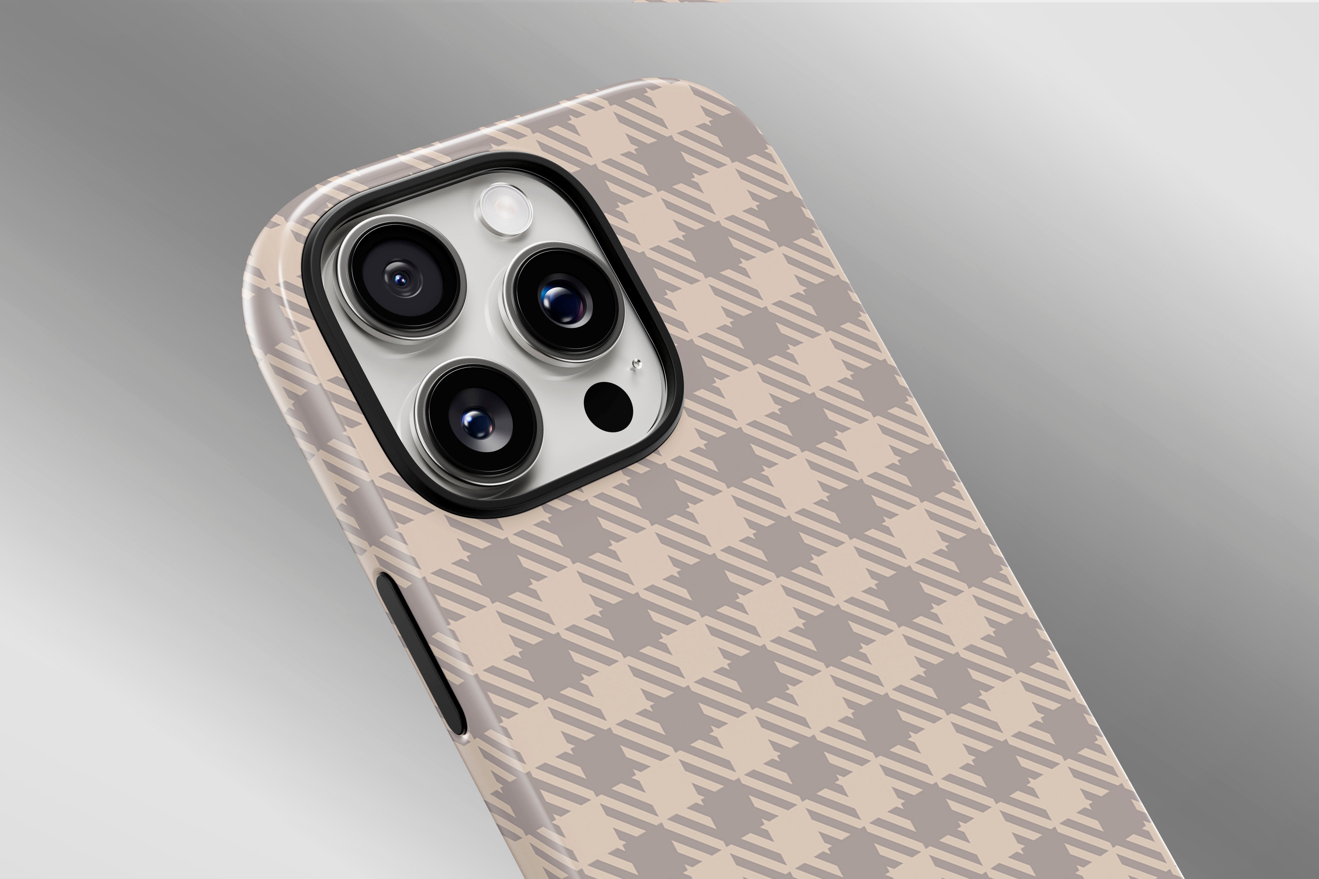 A close up image of a phone case featuring our Muted Houndstooth design