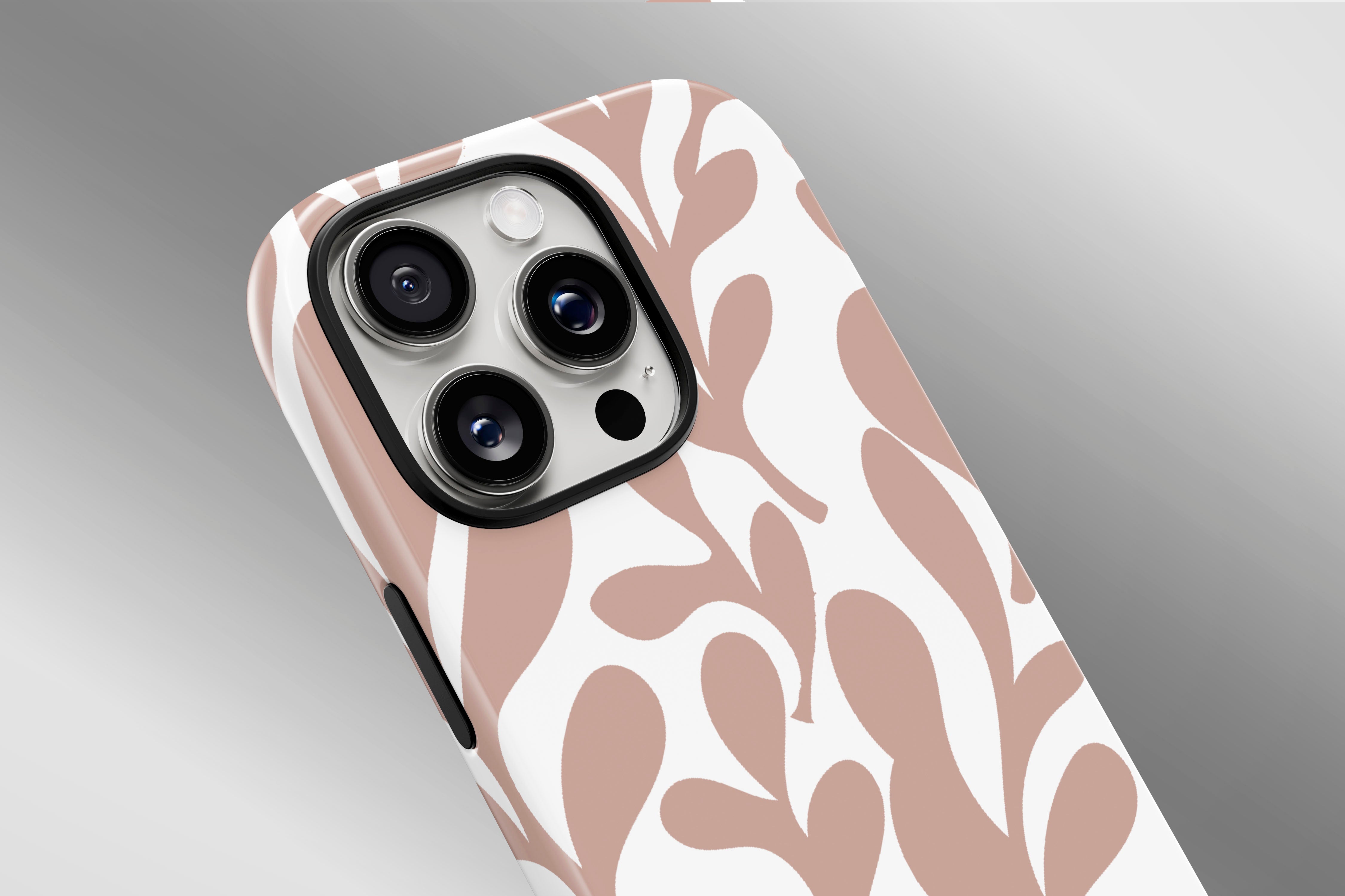 A close up image of a phone case featuring our Peachy Leaf design
